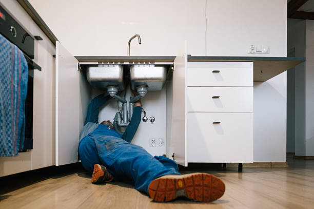 Professional Drain Cleaning technician working in Massapequa Park, NY